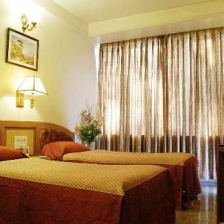 פונה Hotel Mandakini Ambience חדר תמונה