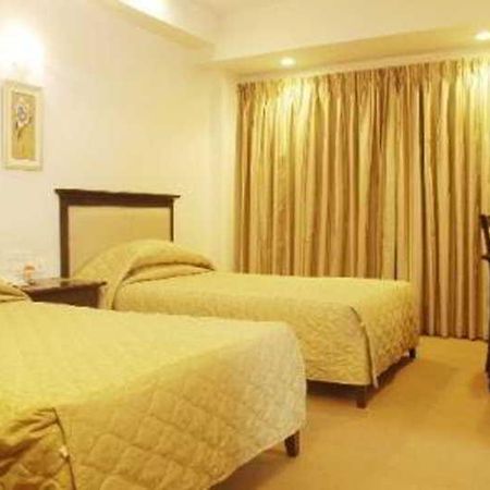 פונה Hotel Mandakini Ambience חדר תמונה